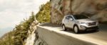 2016 White Hyundai Santa Fe Sport Driving on Cliff
