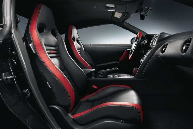Sporty black and red interior of a NIssan