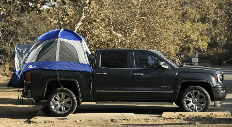 2018 GMC Sierra with a camping tent attachment