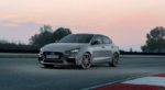 Gray Hyundai i30 fastback N on track at sunset
