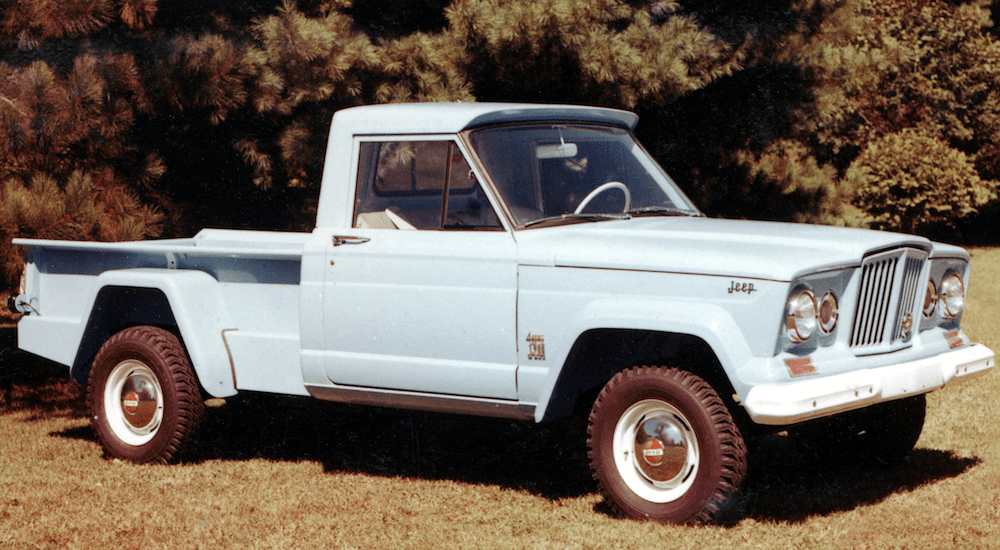 A classic photo of a baby blue 1962 Jeep Gladiator