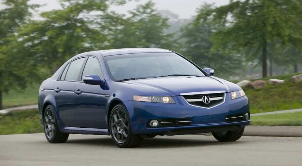 A blue 2008 Acura TL Type S driving