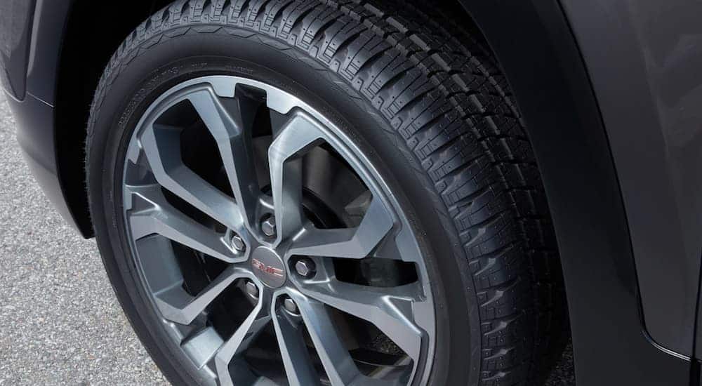 The wheel and rim package on the 2019 GMC Terrain SLT is shown. Check out trims when comparing the 2019 GMC Terrain vs 2019 Nissan Rogue.