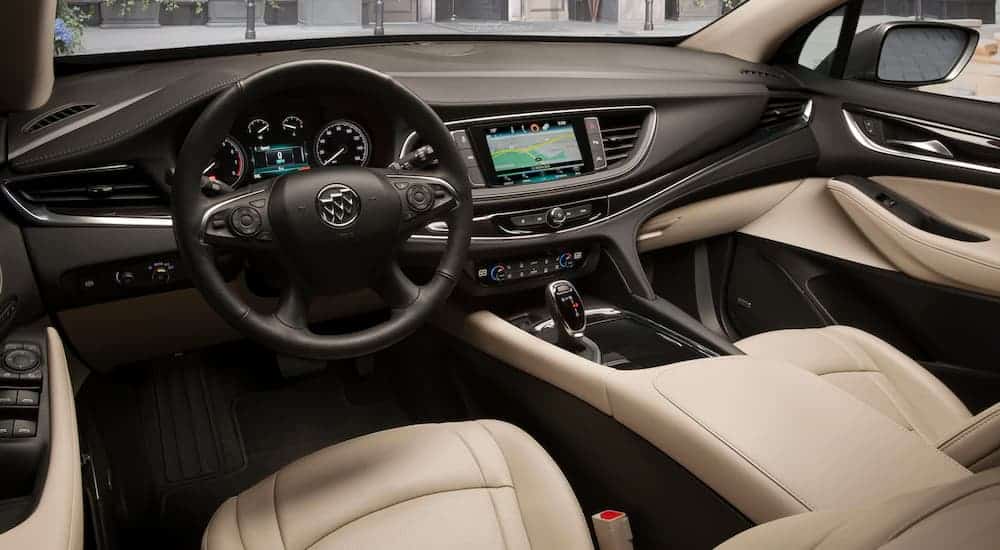 The tan interior is shown in a 2019 Buick ENclave, which wins when comparing the 2019 Buick Enclave vs 2019 Toyota Highlander.