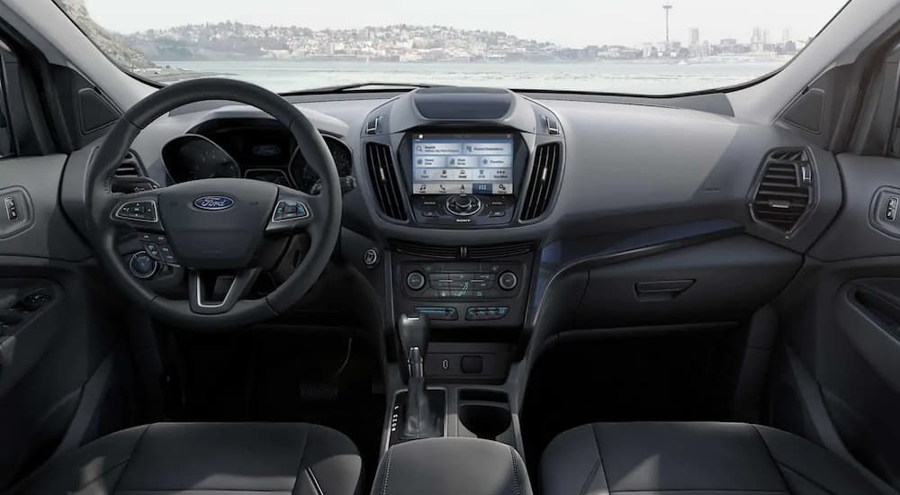 The black interior of a 2019 Ford Escape is shown. Check out interior features when comparing the 2019 Ford Escape vs 2019 Honda CR-V.