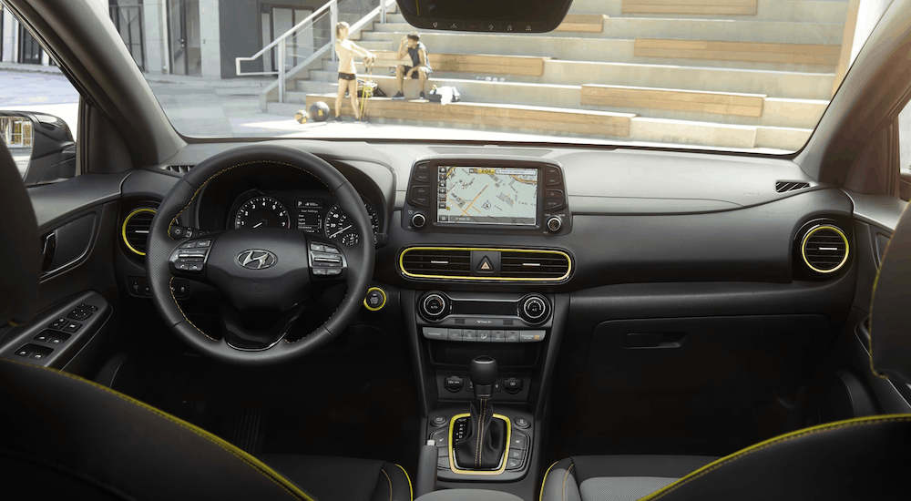 The black interior with yellow accents in a 2019 Hyundai Kona is shown.