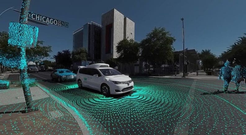 The Waymo self driving vehicle is scanning its environment showing what it would see.