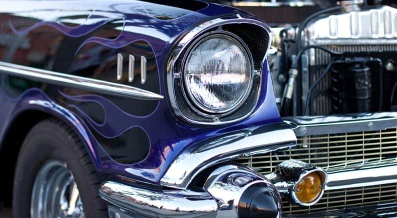 A closeup is shown of the round headlight on a hot rod that would be difficult to find at a Buy Here Pay Here in Lexington, but will be easy to see at the 2nd Kentucky Nationals.