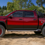 The red TRX concpet is shown from the side and is an exciting part of the line of Ram trucks - RAM Rebel, Power Wagon, TRX, and more.