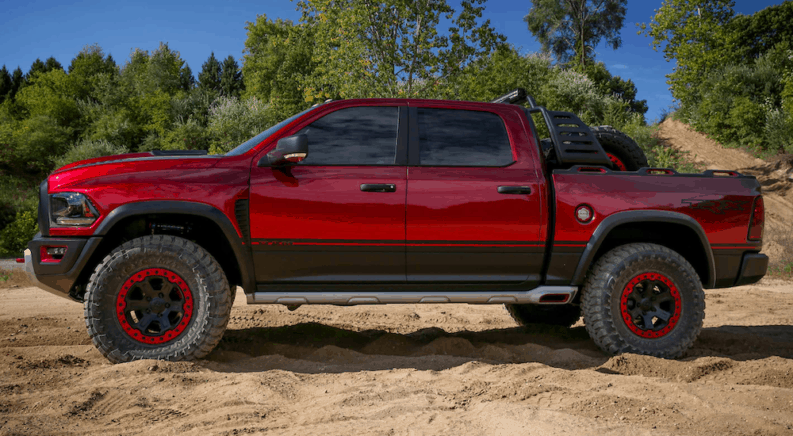The red TRX concpet is shown from the side and is an exciting part of the line of Ram trucks - RAM Rebel, Power Wagon, TRX, and more.