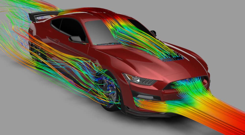 Aerodynamics are shown on a red 2020 Shelby GT500 simulation.