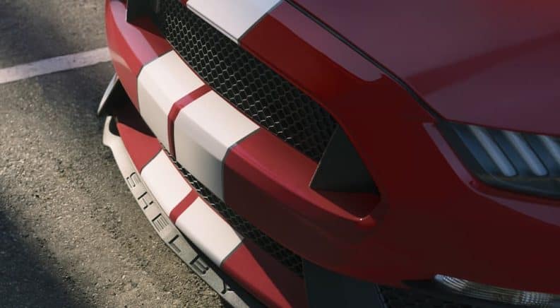 A close up of the front end of a red 2020 Ford Mustang Shelby GT350 is shown.