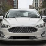 The front end of a white 2020 Ford Fusion.