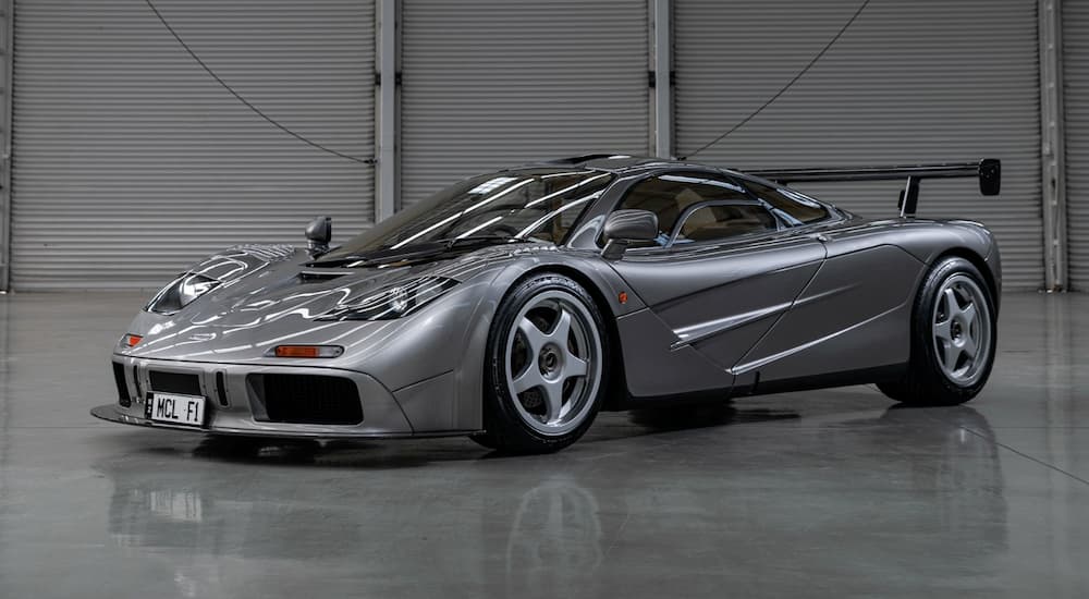 A grey 1994 McLaren F1 'LM-Specification' is in a warehouse. Image: Andrei Diomidov ©2019 Courtesy of RM Sotheby's