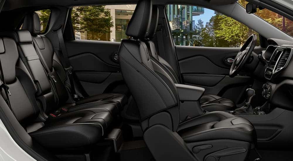The black interior of a 2020 Jeep Cherokee is shown.