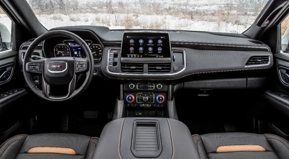 The leather interior of a 2021 GMC Yukon AT4 is shown.