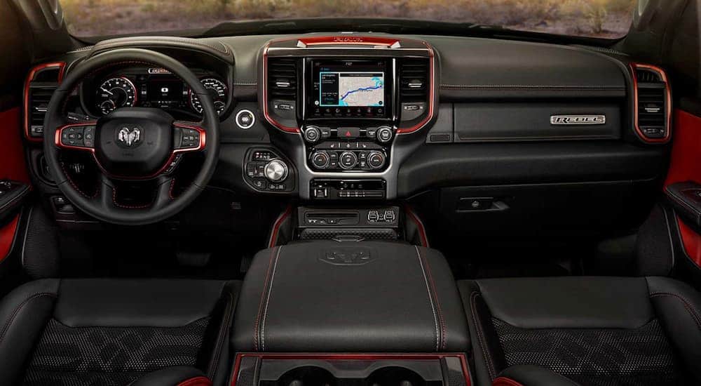 The black and red interior of the 2019 Ram 1500 is shown.