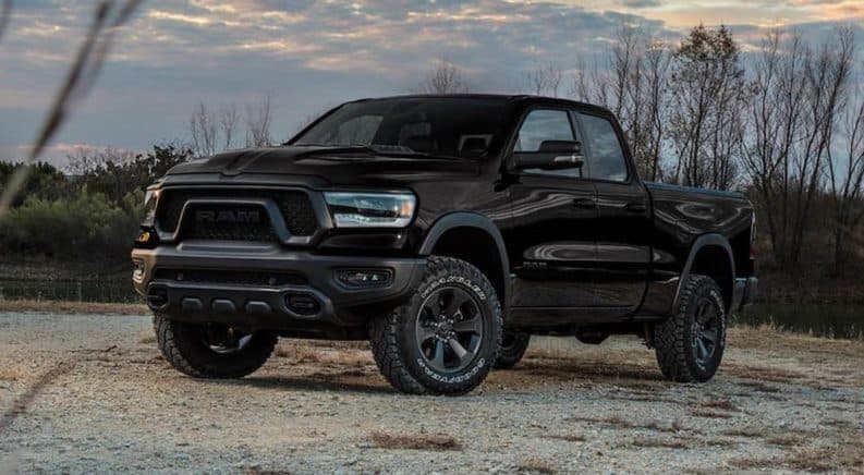 A black 2020 Ram 1500 Rebel is parked in the desert after winning the comparison of 2020 Ram 1500 (new Ram) vs 2020 Ford F-150.