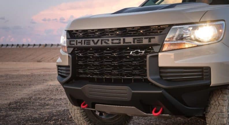 A closeup is shown of a 2021 Chevy Colorado grille.