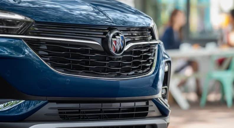 The grille of a blue 2020 Buick Encore GX is shown, which is new among Buick SUVs.
