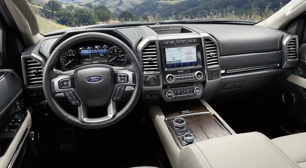 The gray interior of a 2020 Ford Expedition is shown, winner of the 2020 Ford Expedition vs 2020 Chevy Tahoe competition.