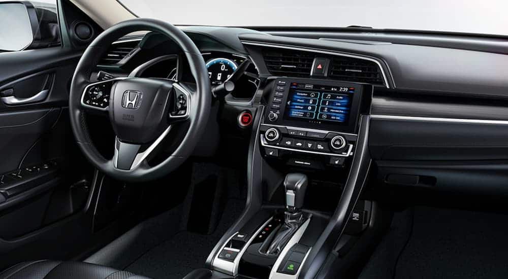 The black interior of a 2020 Honda Civic Sedan is shown.