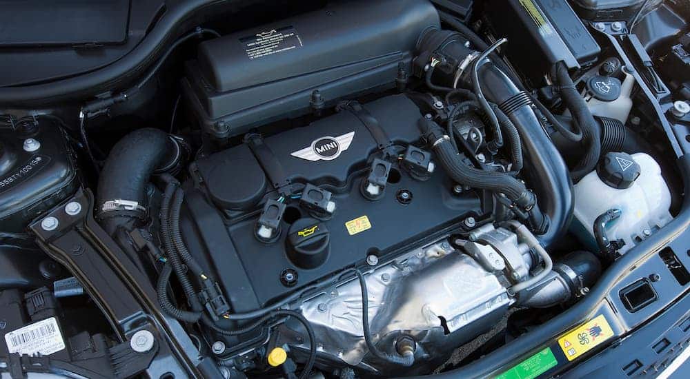 The engine is shown on a 2011 MINI Cooper Hardtop.