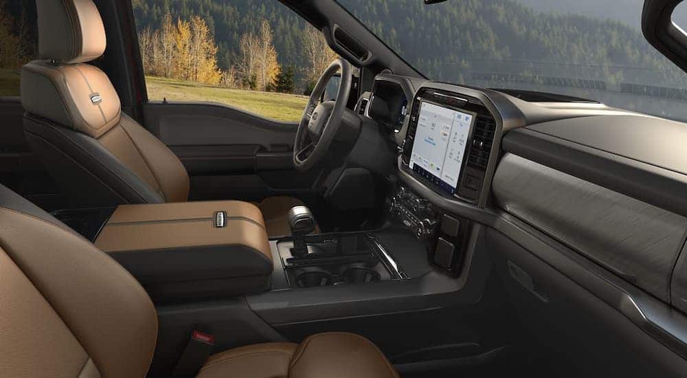 The interior of a 2021 Ford F-150 Platinum is shown from the passenger side.