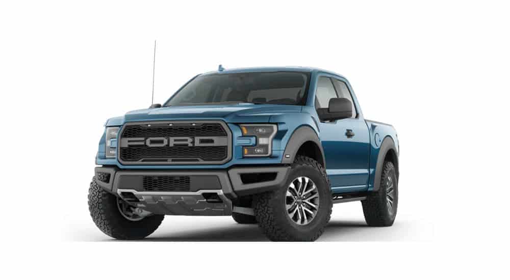 A blue 2020 Ford Raptor is angled left on a white background.