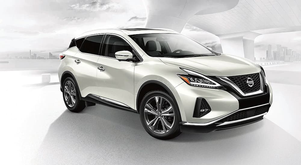 A white 2021 Nissan Murano is showm from the front, angled right.