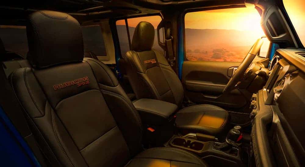 The black interior and bronze 392 stitching is shown on a 2021 Jeep Wrangler Rubicon 392.