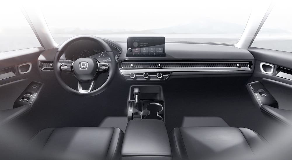 The black interior is shown in a 2022 Honda Civic prototype.