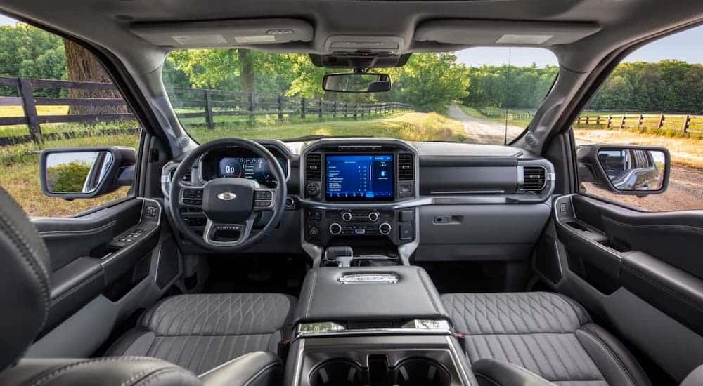 The gray interior and dashboard are shown in a 2021 Ford F-150.