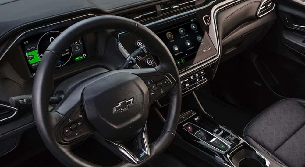 The steering wheel and dashboard are shown in a 2022 Chevy Bolt EV.