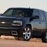 A black 2006 used Chevy Trailblazer SS is shown from the front parked on pavement.