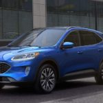 A blue 2021 Ford Escape is shown from the front parked at a crosswalk.