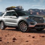 A silver 2021 Ford Explorer is parked in the desert after winning a 2021 Ford Explorer vs 2021 Jeep Grand Cherokee comparison.