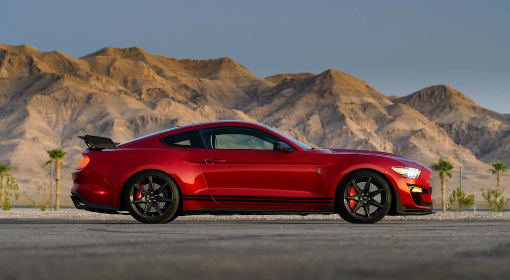 A red used 2020 Ford Mustang Shelby GT500 is parked on a track.