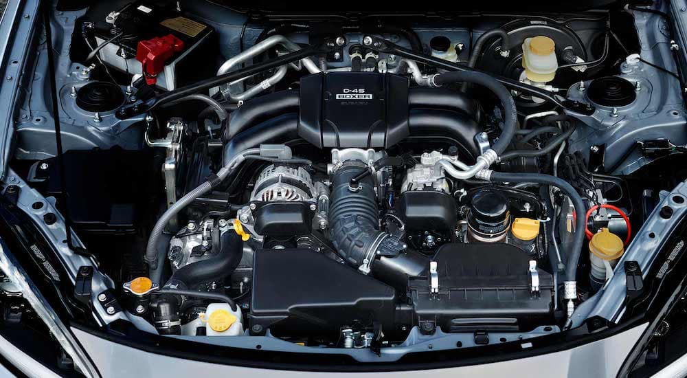 A close up shows the Boxer engine in a 2022 Subaru BRZ.