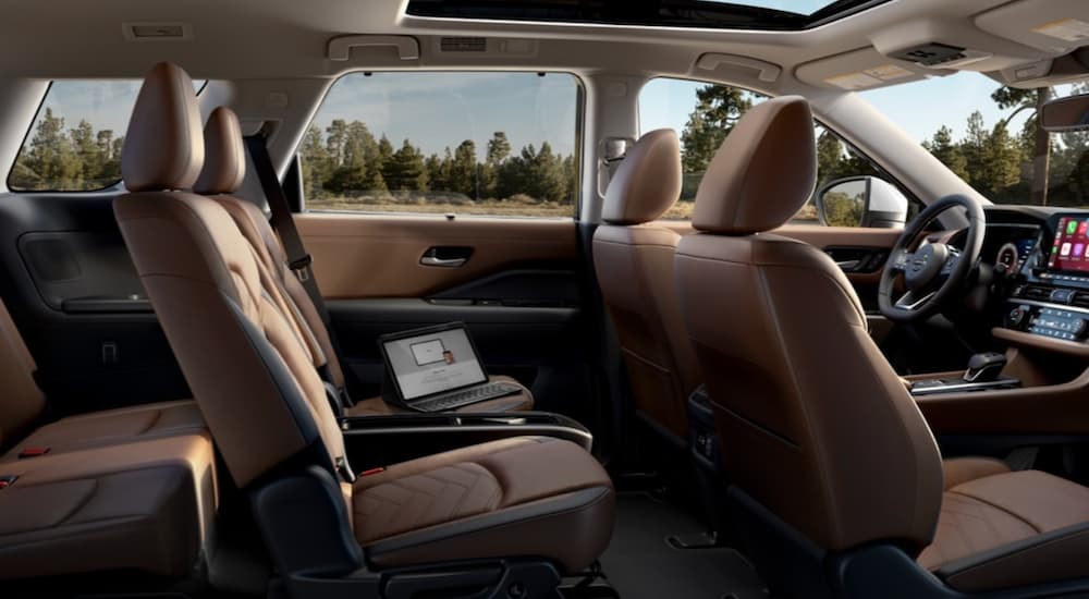 The interior of a 2022 Nissan Pathfinder shows three rows of seating.
