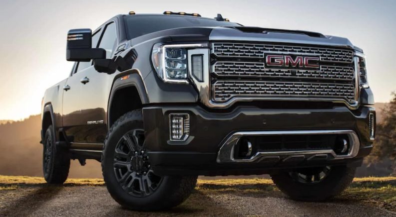 A black 2021 GMC Sierra 2500 is shown from a low angle after winning a 2021 GMC Sierra 2500 vs 2021 Chevy Silverado 2500 comparison.