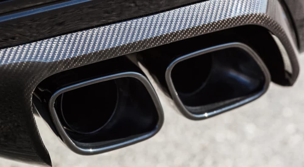 A black 2022 Cadillac CT5-V Blackwing shows the exhaust in close up.