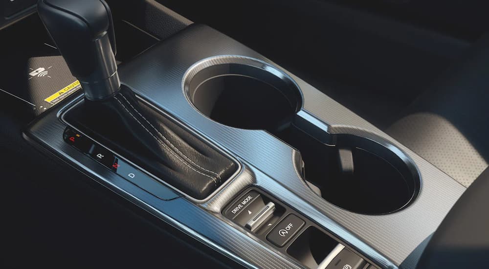 The interior of a 2022 Honda Civic Touring shows the cup holder.
