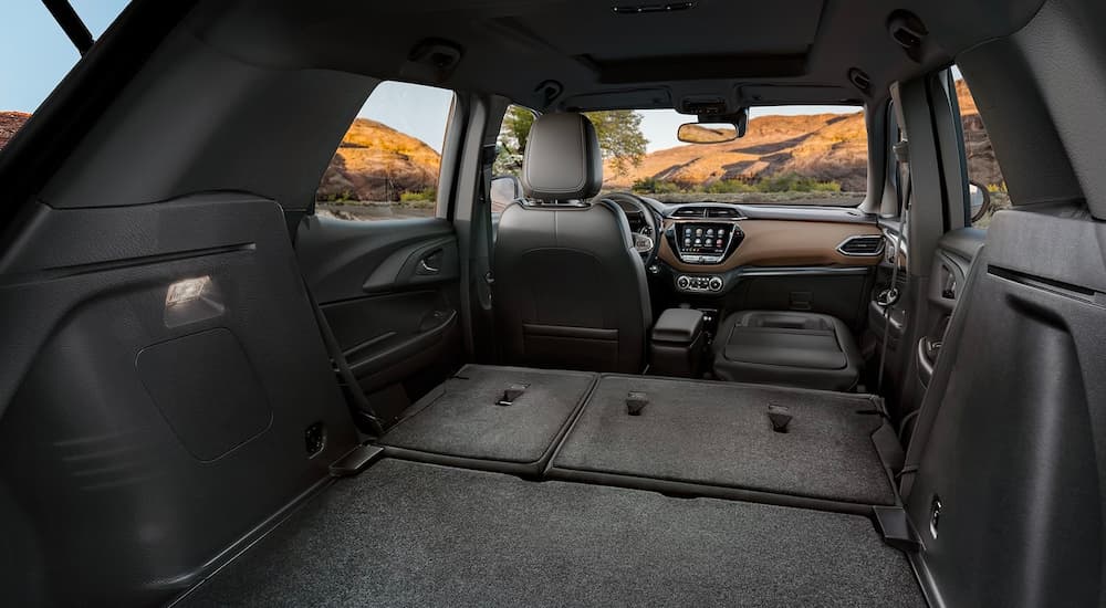 Shown is the interior cargo space of a 2022 Chevy Trailblazer with black and brown accents.