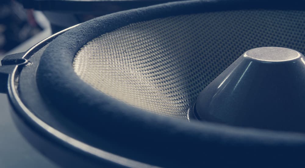 A close up shows a car speaker.