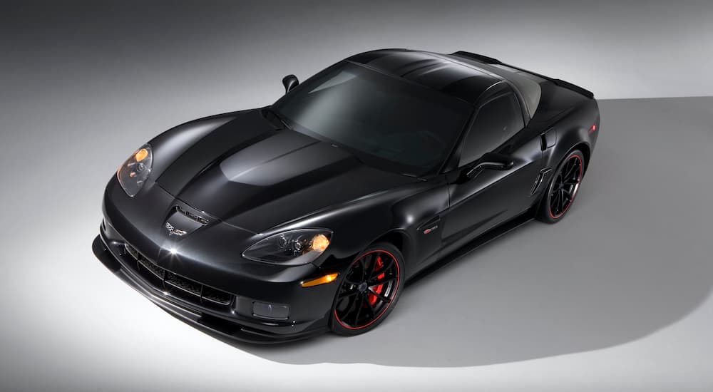 A black 2012 Chevy Corvette Z06 Centennial Edition is shown from a high angle. 