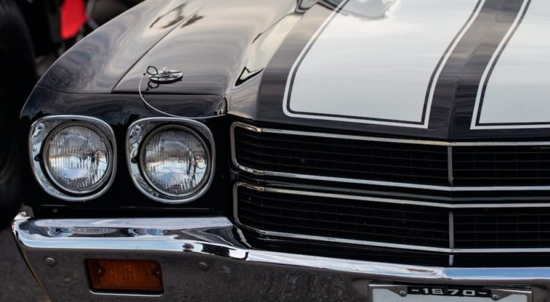 A close up shows the headlight of 1970 Chevy Chevelle SS after visiting one of top local car dealers.