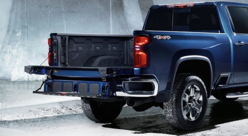A blue 2022 Chevy Silverado 2500 HD is shown from the rear.