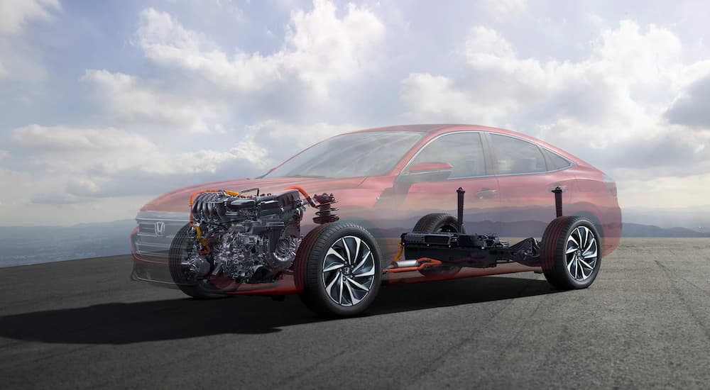 A see-through 2022 Honda Insight shows the powertrain system.