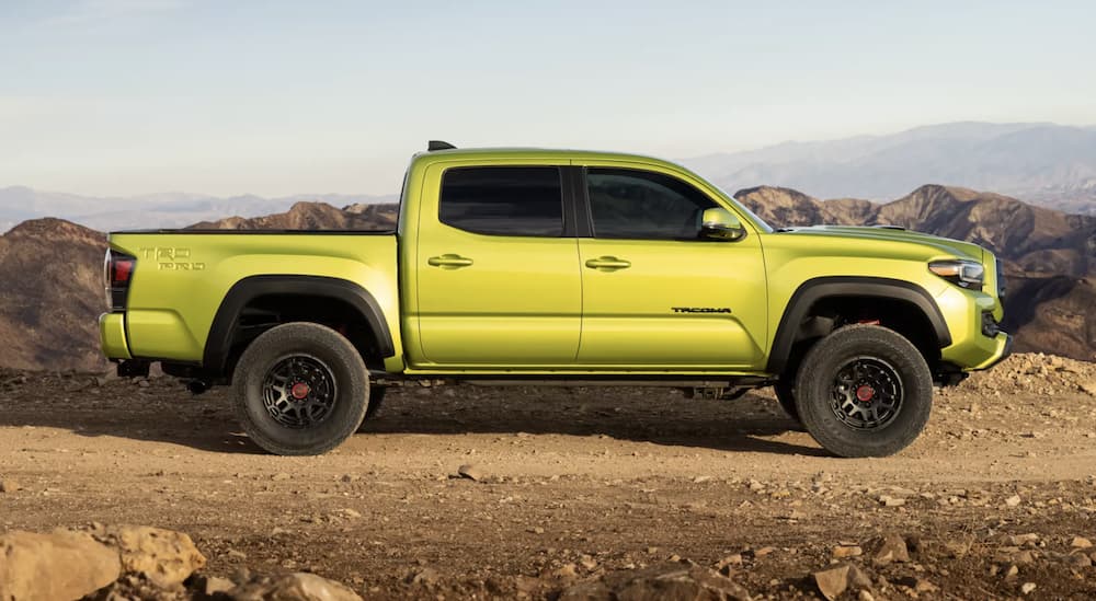 A green 2022 Toyota Tacoma TRD Pro Double Cab is shown from the side.